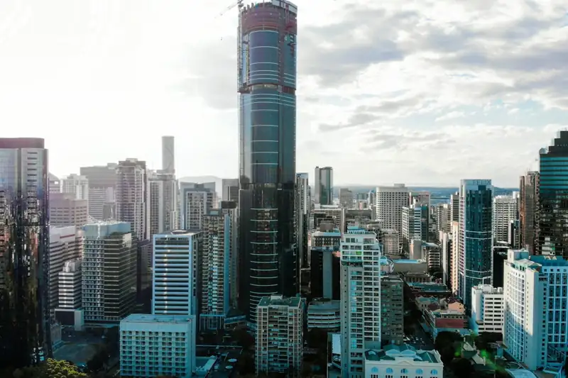 Aerial view over Brisbane apartment and office buildings towards the inner north